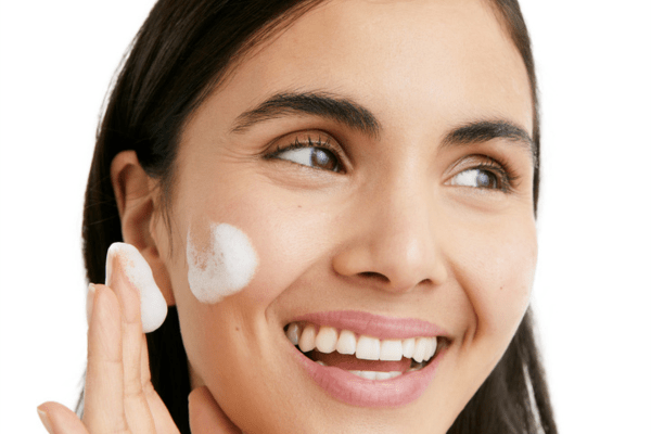 Woman washing her face