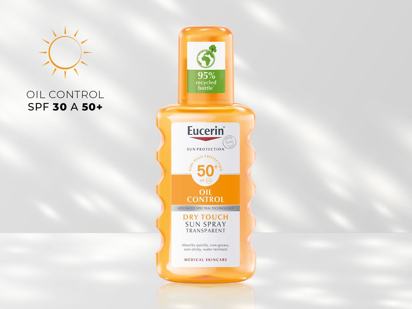 Transparentný sprej na opaľovanie Dry Touch Oil Control SPF 50+