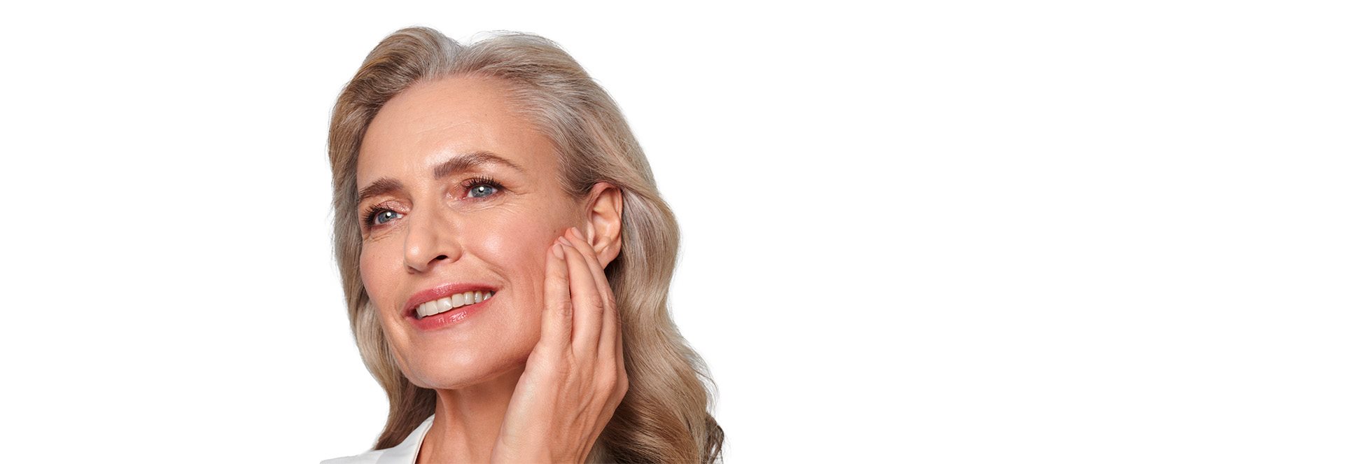 Middle aged woman touching her smiling