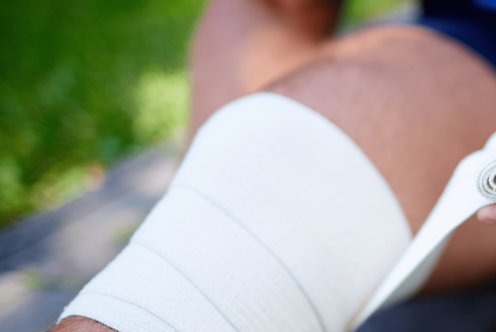 person wrapping burn