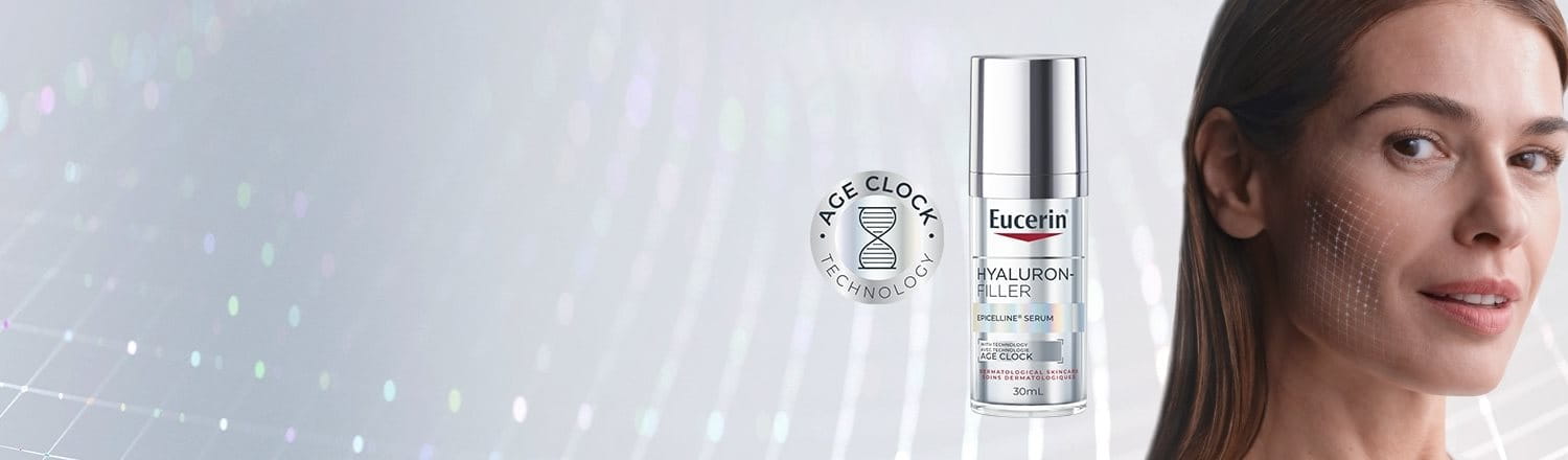 A product shot of Eucerin Hyaluron-Filler Epicelline Serum (30ml) placed next to a close-up shot of a woman's face with a matrix superimposed on her cheeks implies the product's effectiveness in fighting signs of aging.