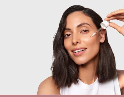 Women Applying Eucerin Face Serum