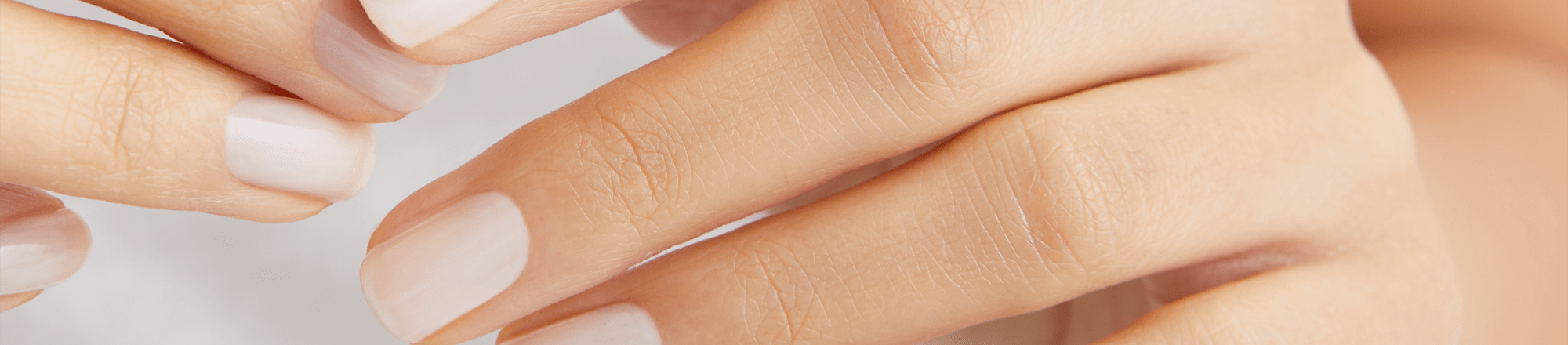 a person applying hand cream