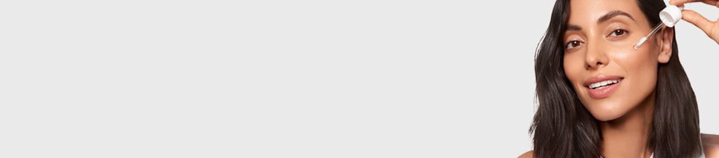 Women applying Eucerin Serum