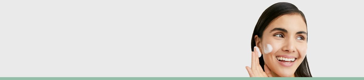 Woman Applying Anti-acne Product