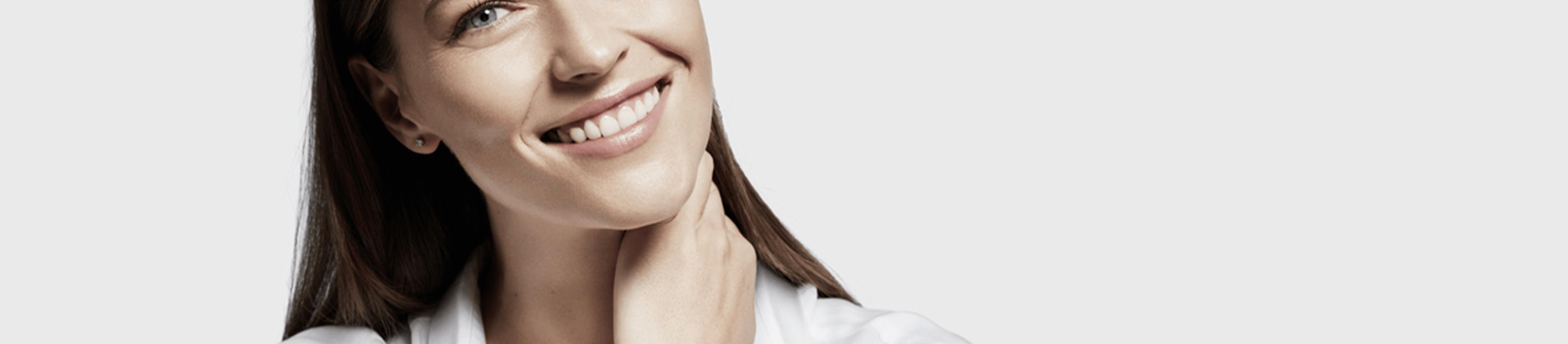 A woman smiling.