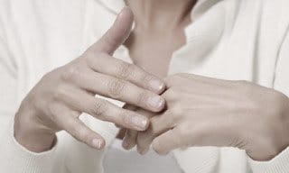 Two female hands.