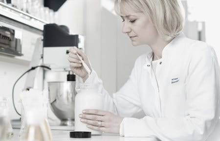 Female scientist is working in a laboratory. 