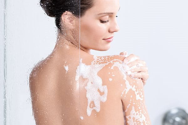 Woman cleansing under the shower