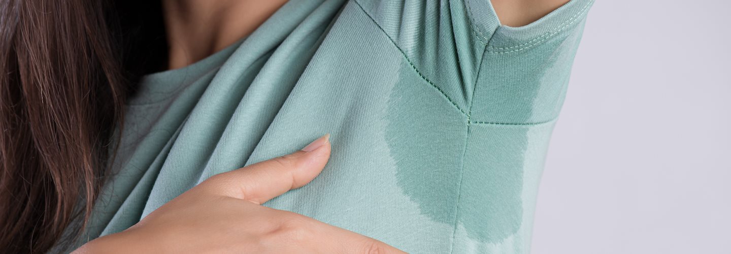 Schweißfleck unter der Achsel