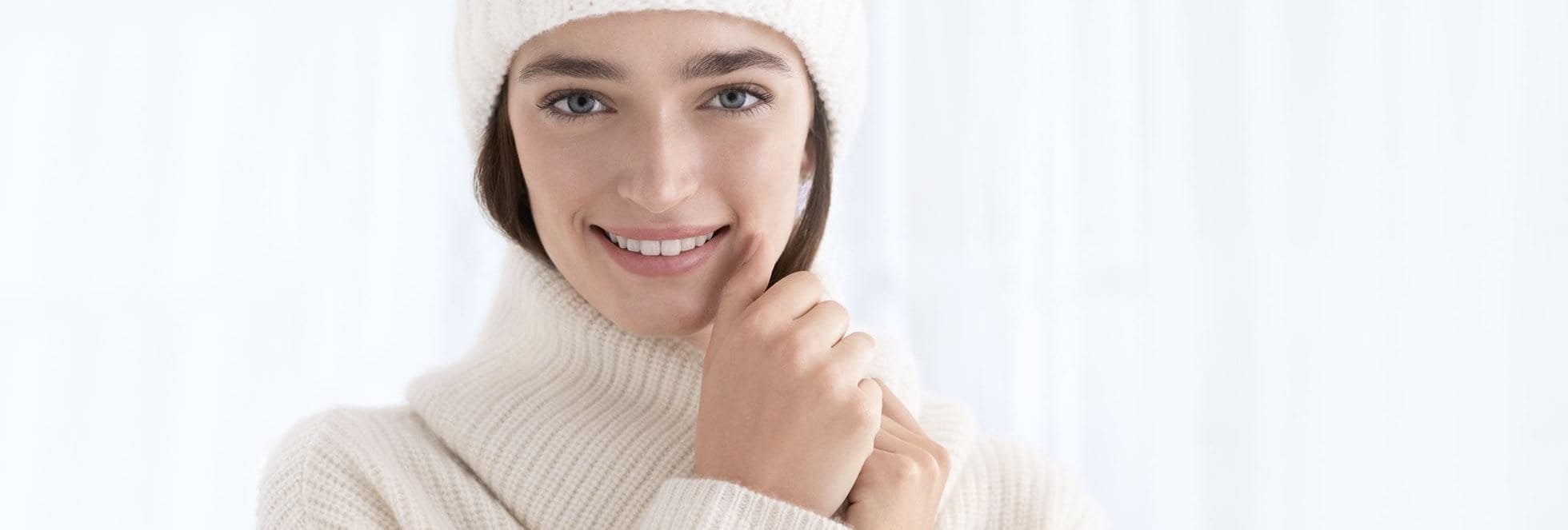 Woman wearing winter hat and scarf
