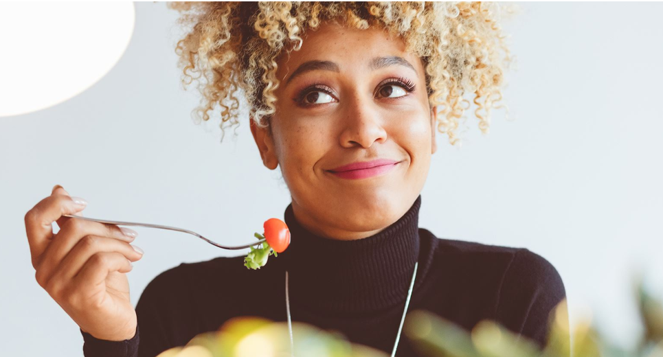 Woman eating a salad