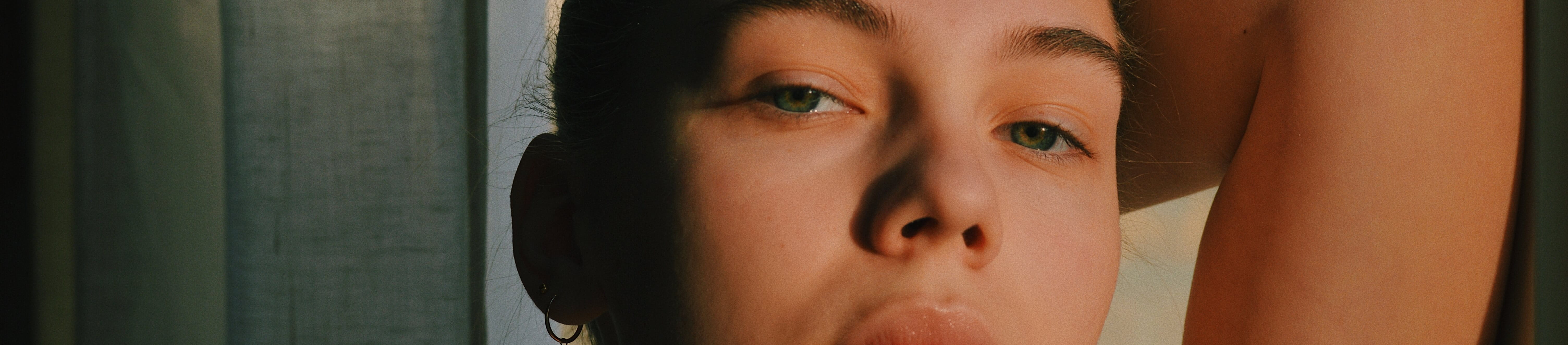 Close up headshot of female with combination skin