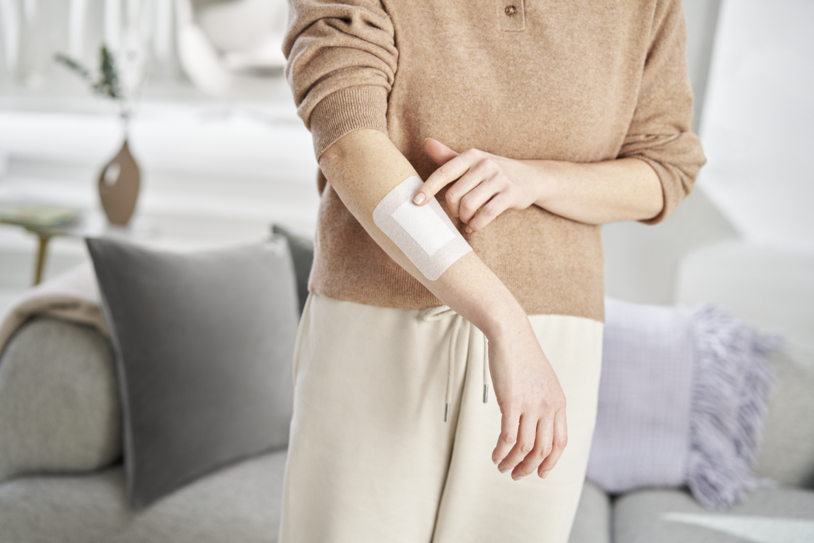 Women with fragile skin have an Ultra Sensitive plaster on their arm	 