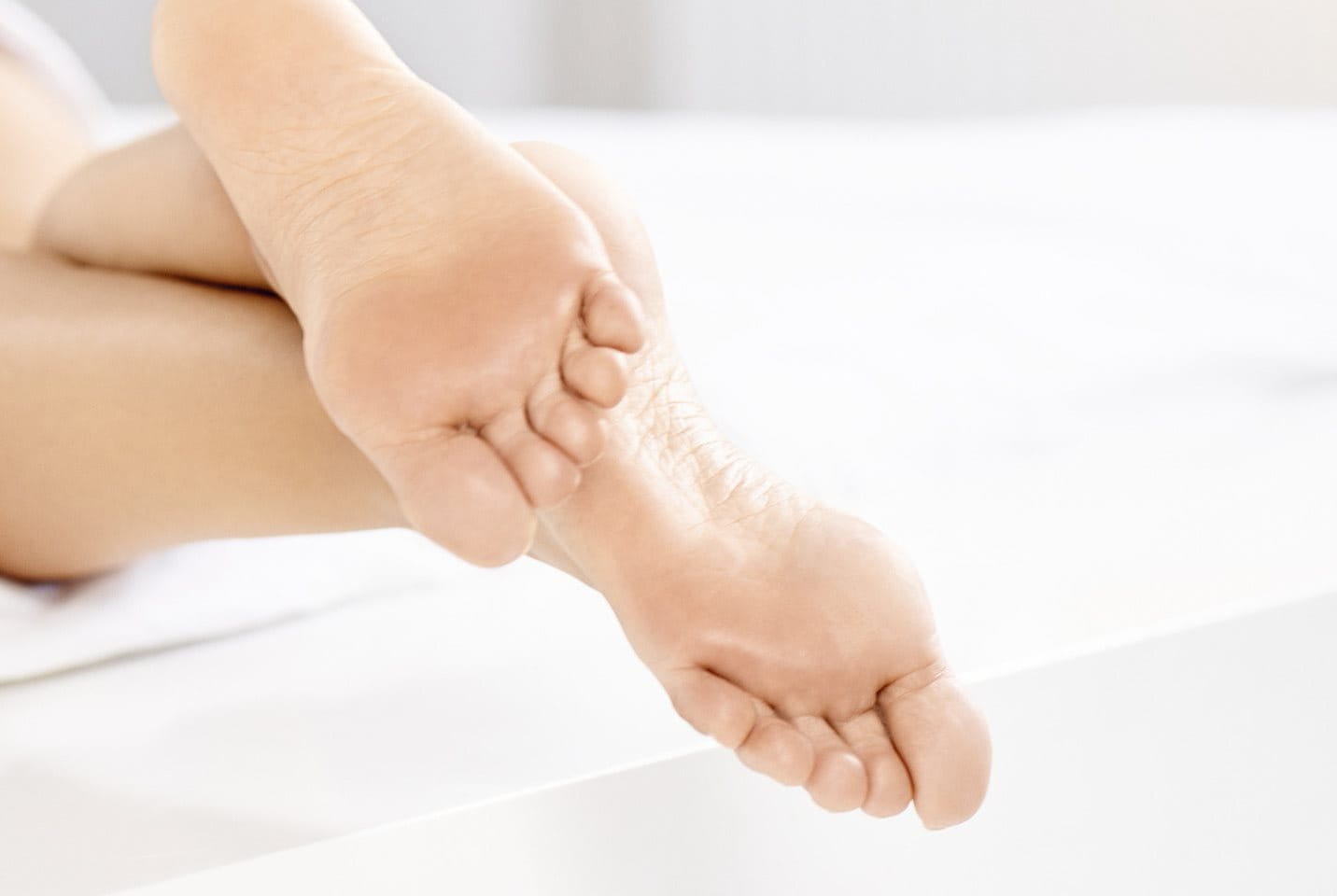 Hühneraugen an den Füßen entfernen