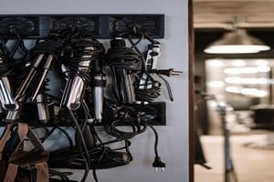 hair appliances hung up on wall