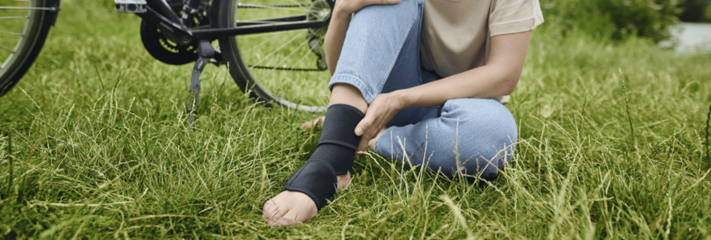 woman experiencing a sprained ankle