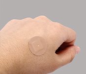 The wound pad is applied on the cut or scratch