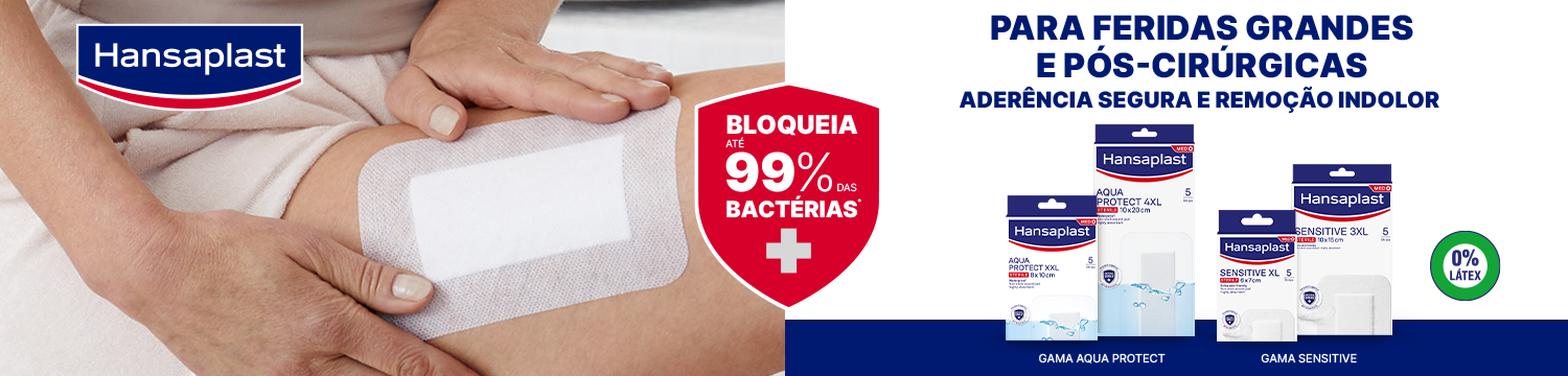 A grandmother is smiling while holding her grandchild. Parts of her right forearm are covered with a Hansaplast Ultra Sensitive Plaster in the new XXL size.