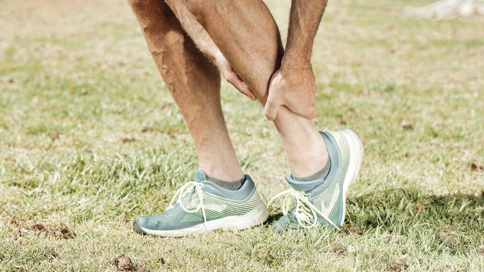 A guy having a sprain ankle